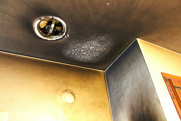 Ceiling bubbled and burned after fire in the kitchen