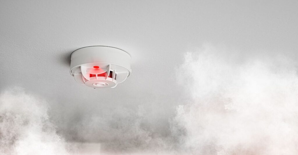 Smoke alarm blinking due to house fire